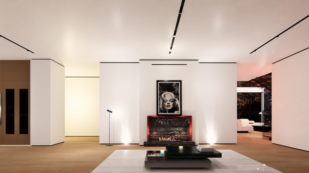 Modern living room with a fireplace, Marilyn Monroe artwork, and sleek, minimalist décor.